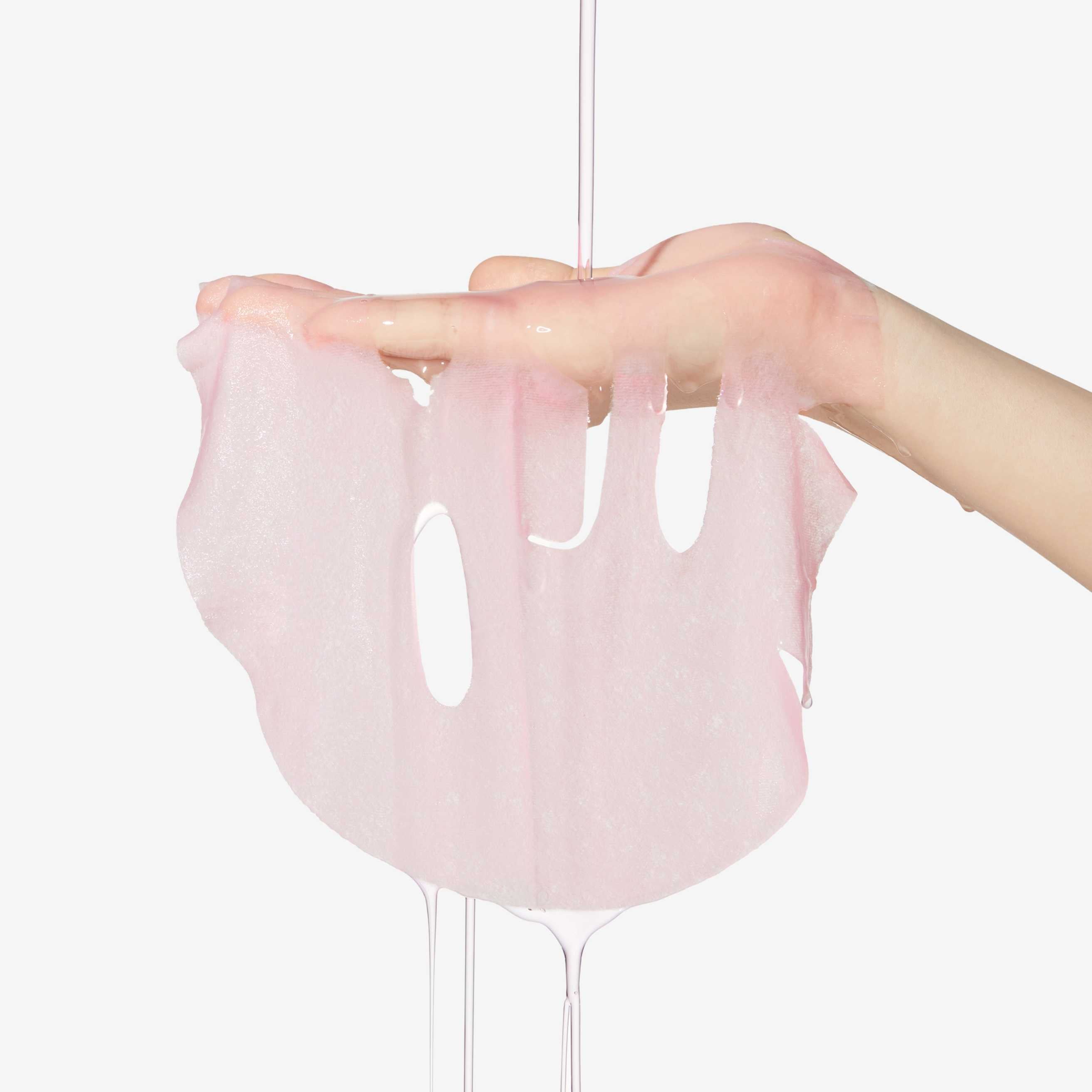 Rosa hydrogelmaske fra Medicube med tett passform til ansiktet